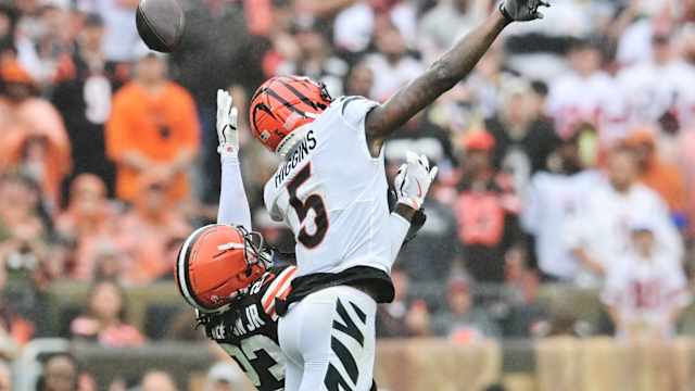Sep 10, 2023; Cleveland, Ohio, USA; Cleveland Browns cornerback Martin Emerson Jr. (23) and Cincinnati Bengals wide receiver Tee Higgins (5) go for a pass during the second half at Cleveland Browns Stadium. Mandatory Credit: Ken Blaze-USA TODAY Sports